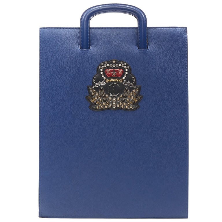 CHRISTIAN LOUBOUTIN Trictrac blue crest studded leather side zip portfolio  bag at 1stDibs