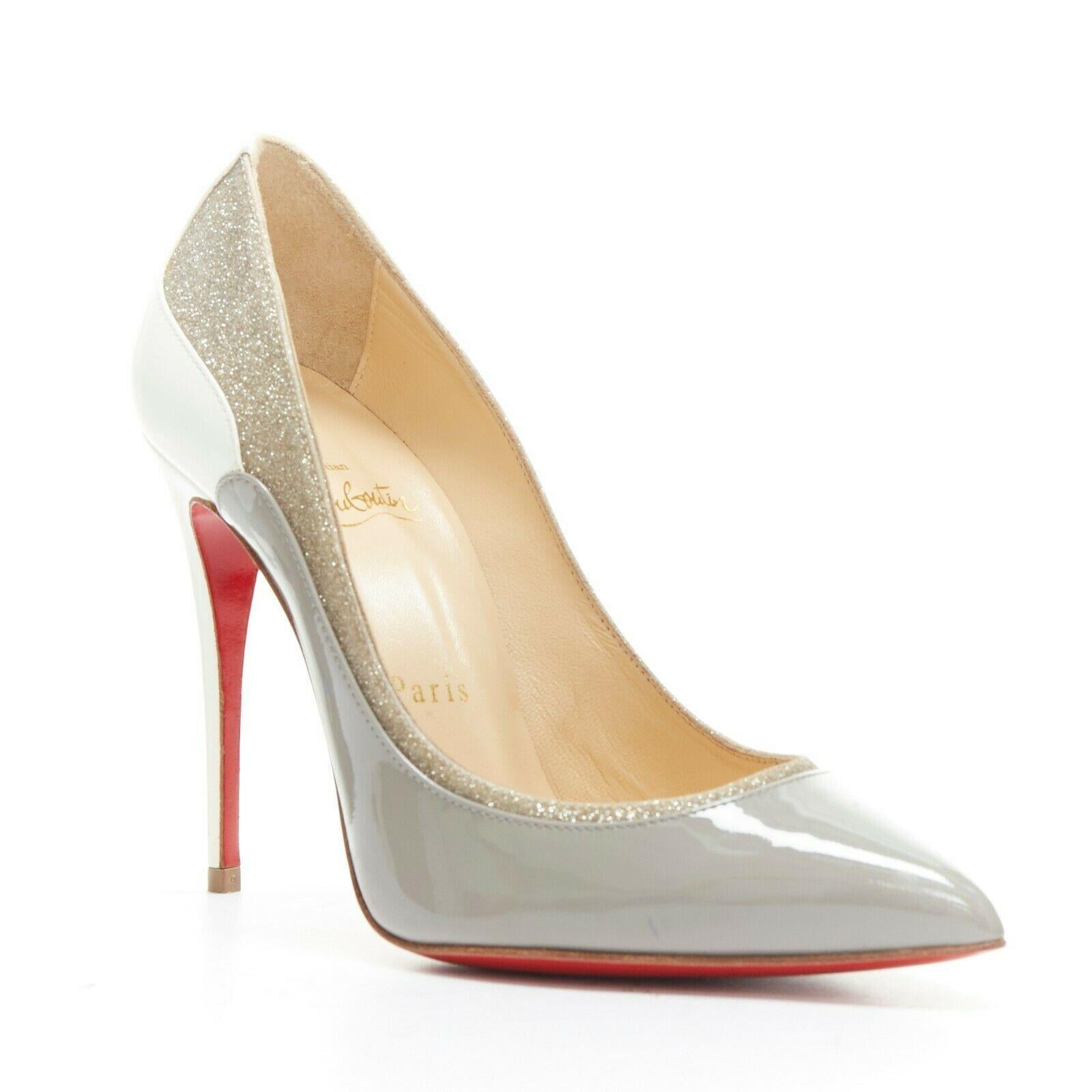 CHRISTIAN LOUBOUTIN Tucsick 100 grey white glitter patent pump high heel EU36
CHRISTIAN LOUBOUTIN
Style Arletta 105. Scarpin silhouette. 
Constructed with grey, white patent and glittered leather. Pointed toe design. Interior lined with tan leather.