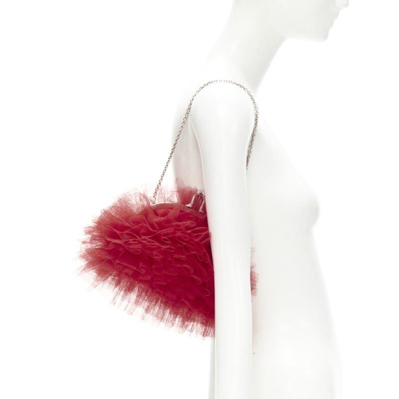 CHRISTIAN LOUBOUTIN Tutulle red tulle strass crystal heel clasp clutch bag
Reference: TGAS/C01233
Brand: Christian Louboutin
Model: Tutulle
Material: Satin
Color: Red, Silver
Pattern: Solid
Closure: Clasp
Lining:  Fabric
Extra Details: Silver-tone