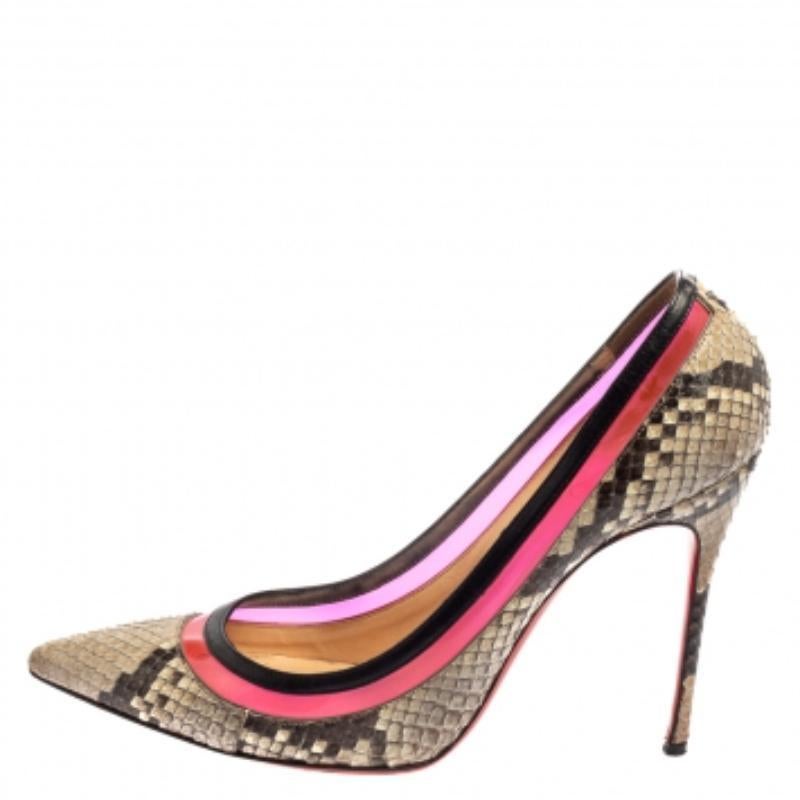 Slip into these stunning Christian Louboutin Paulina pumps and add grace to your strides. Crafted from two-one python leather and leather, these pumps are detailed with PVC trims. With pointed toes and 11 cm heels, these pumps will give a feel of