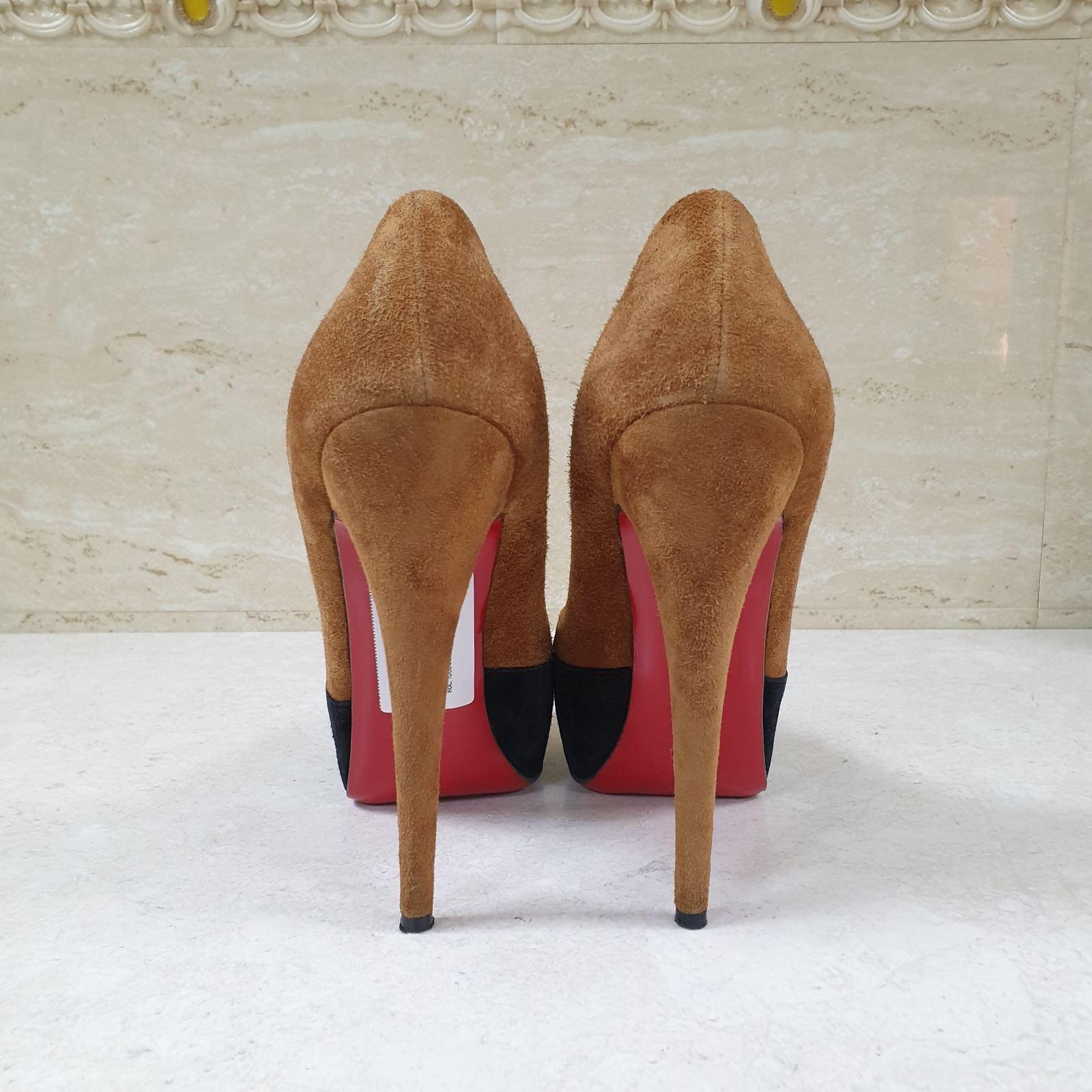 Christian Louboutin brings you this pair of Maggie pumps that will elongate your feet and give you confidence in every step. 
They are made from suede and designed with embellished cap toes and concealed platforms. 
The pumps also carry comfortable