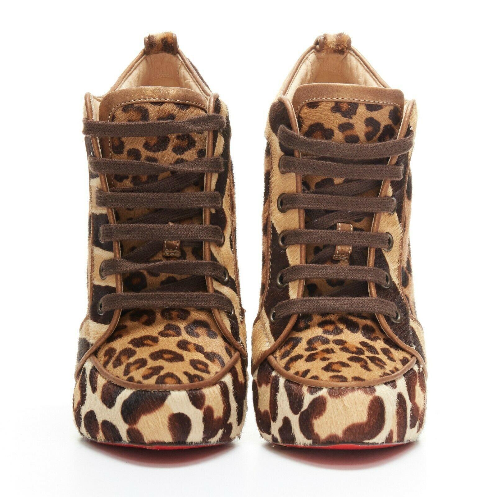 CHRISTIAN LOUBOUTIN Venus Orlato 140 leopard pony hair laced booties EU39.5
CHRISTIAN LOUBOUTIN
Venus Orlato 140. Leopard printed pony hair. 
Almond toe. Concealed platform sole. Copper leather piping. 
Gold logo Badge on the inner side of shoe.