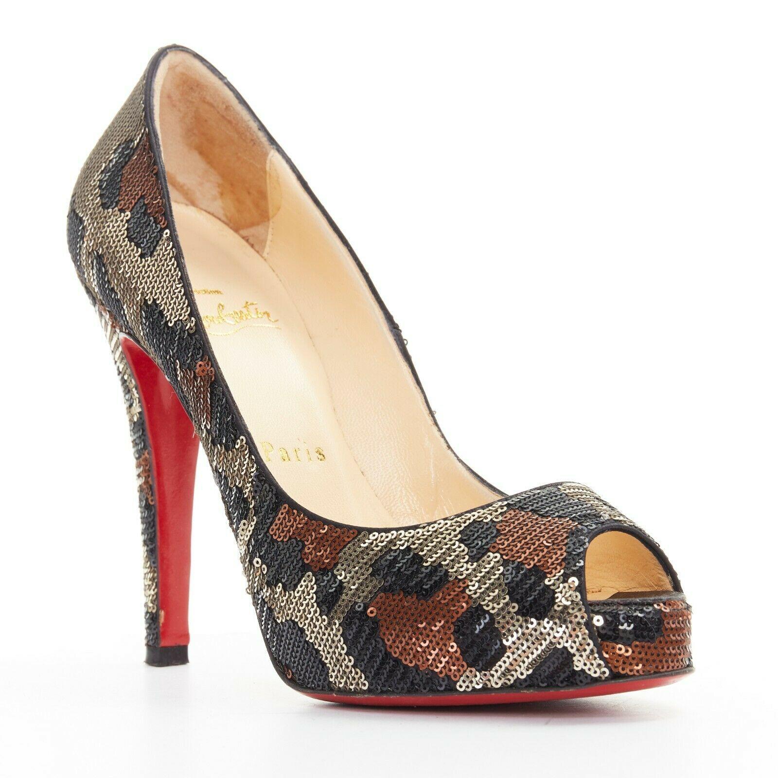 CHRISTIAN LOUBOUTIN Very Prive 120 leopard sequins peep toe platform heel EU35.5
CHRISTIAN LOUBOUTIN
Very Prive 120. 
Gold leopard sequins upper. 
Peep toe. 
Concealed platform sole. 
Slim high heel. 
Padded tan leather lining. 
Signature Christian