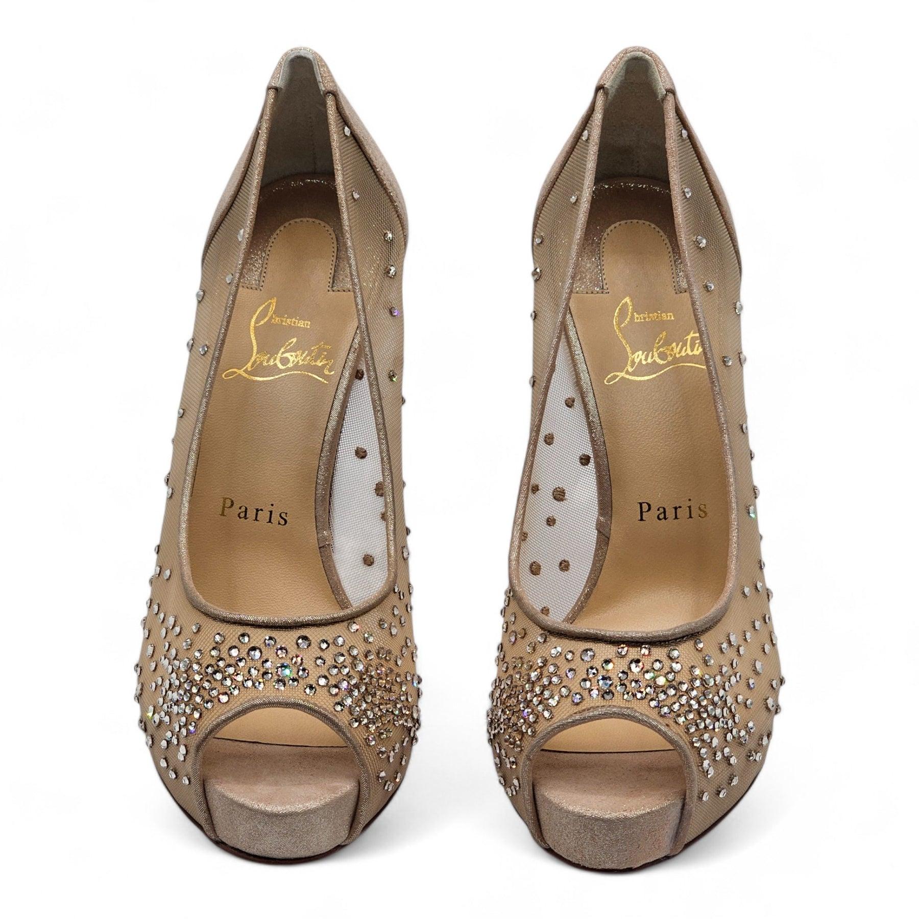 Christian Louboutin Very Strass Peep Pumps Net in Nude.

Signature red bottoms.

Additional information:
Material: Net, suede, strass in nude
Color: Beige
Size: 6.5 US
Condition: Brand new with box, The box is damaged.