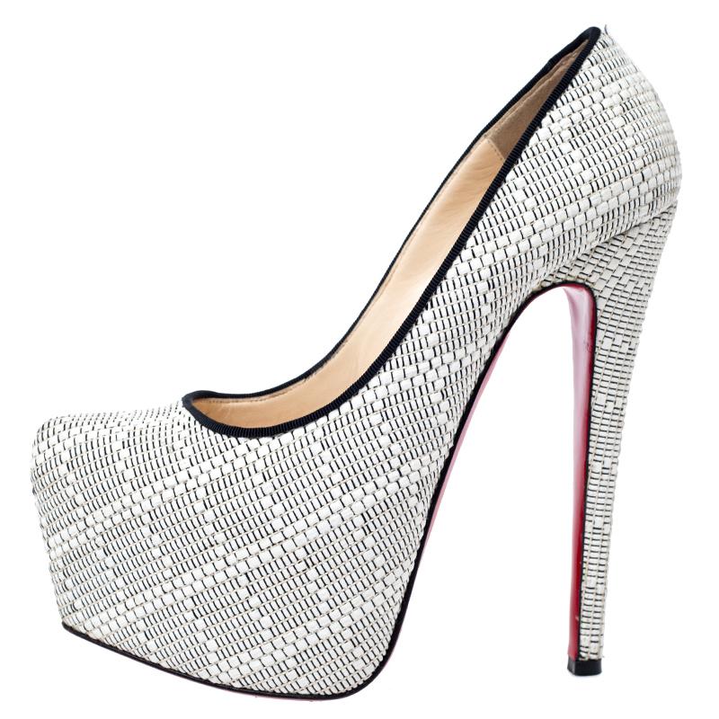 Take your love for Louboutins to new heights by adding this gorgeous pair to your collection. The pumps simply speak high fashion in every stitch and curve. The exteriors come made from white raffia and the pumps are finished with platforms, 15.5 CM