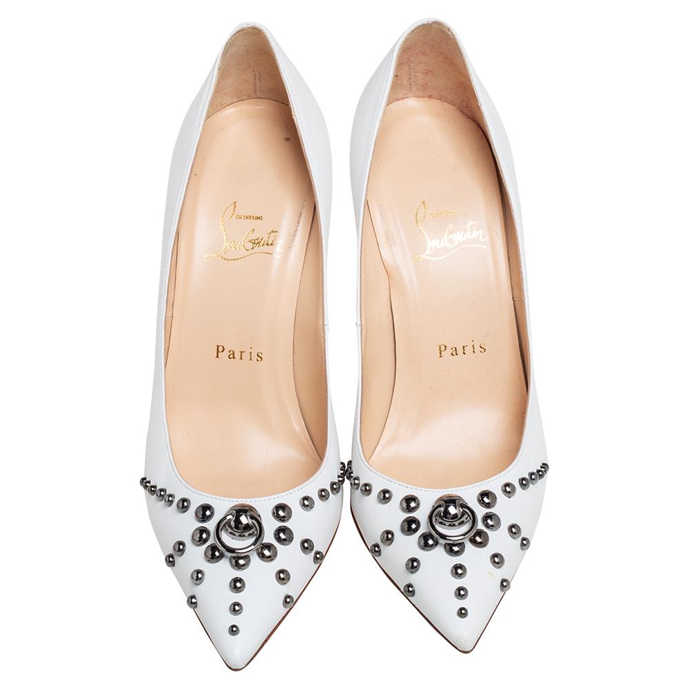 These pumps crafted from white leather are worth the buy and reflect the label's immaculate artistry. Designed by Christian Louboutin, they feature stud details, pointed toes, and 1o.5 cm heels. Let these gorgeous Door Knock pumps speak for
