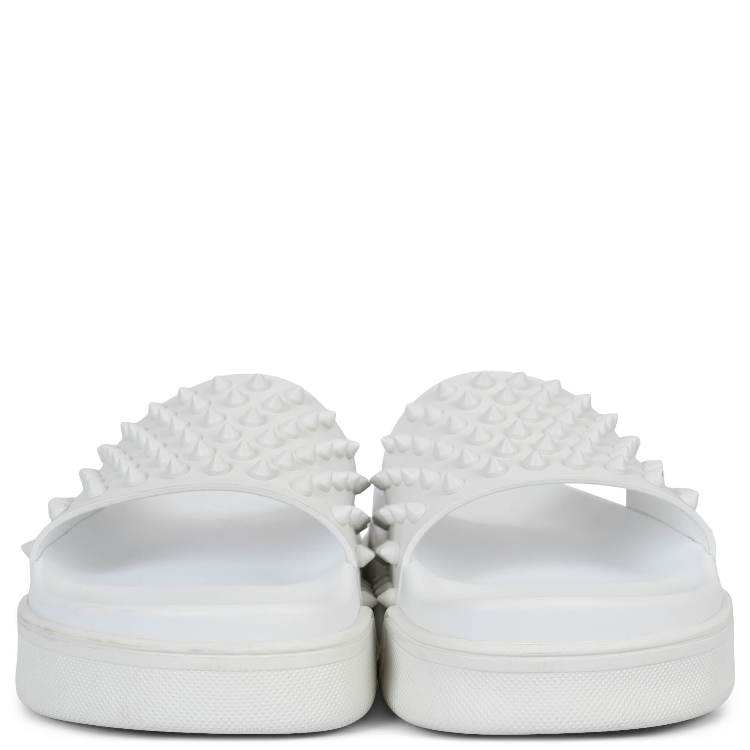 100% authentic Christian Louboutin Pool Fun Donna spiked slide sandals in white rubber. Have been worn once and are in virtually new condition. 

Measurements
Imprinted Size	38
Shoe Size	38
Inside Sole	24cm (9.4in)
Width	8cm (3.1in)
Platform:	4.5cm