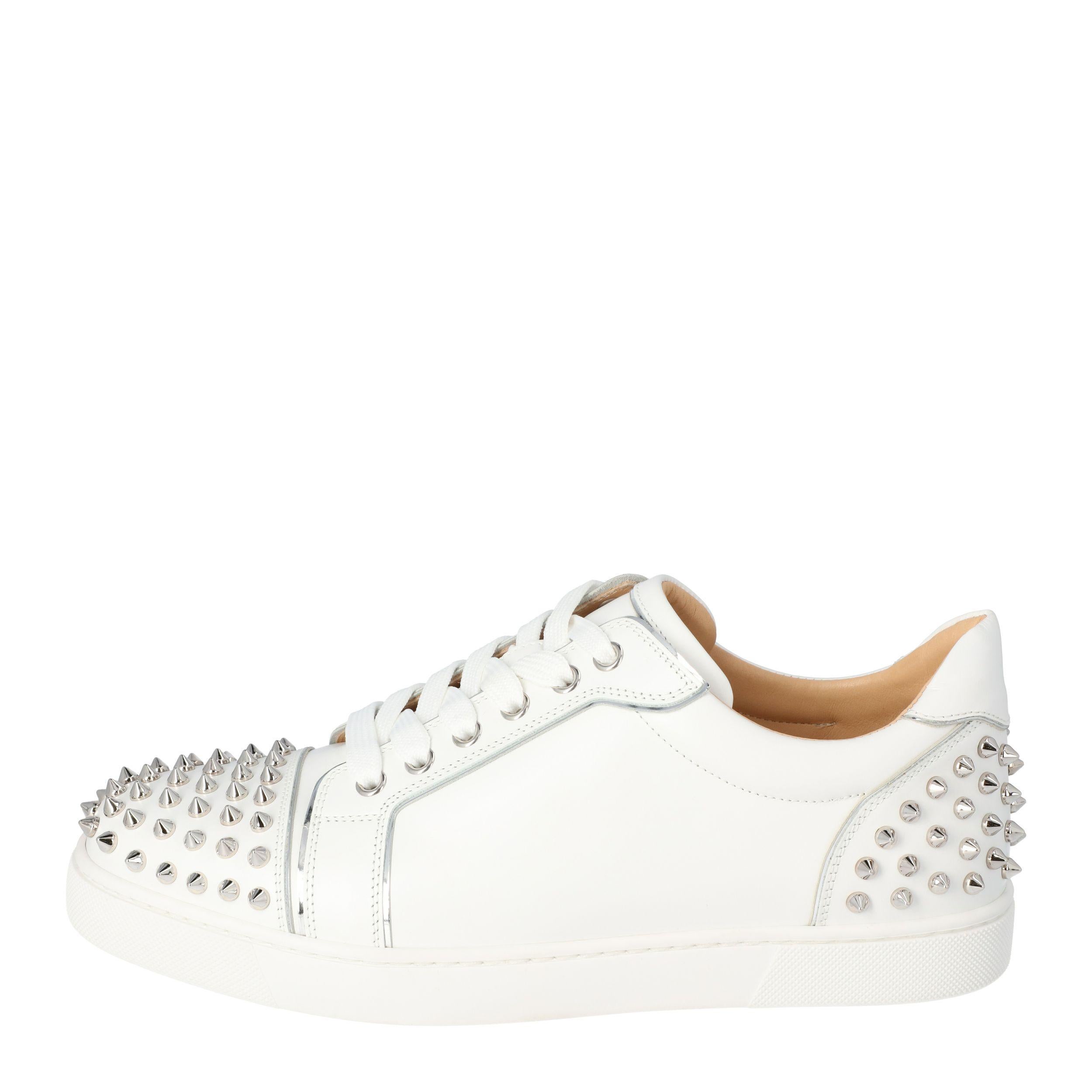 Embrace the look of contemporary styling with this pair of sneakers from the house of Christian Louboutin. Crafted from luxuriously fine leather, these stylish shoes feature a lace-up design for unmatched comfort. A spike studded design elevates the