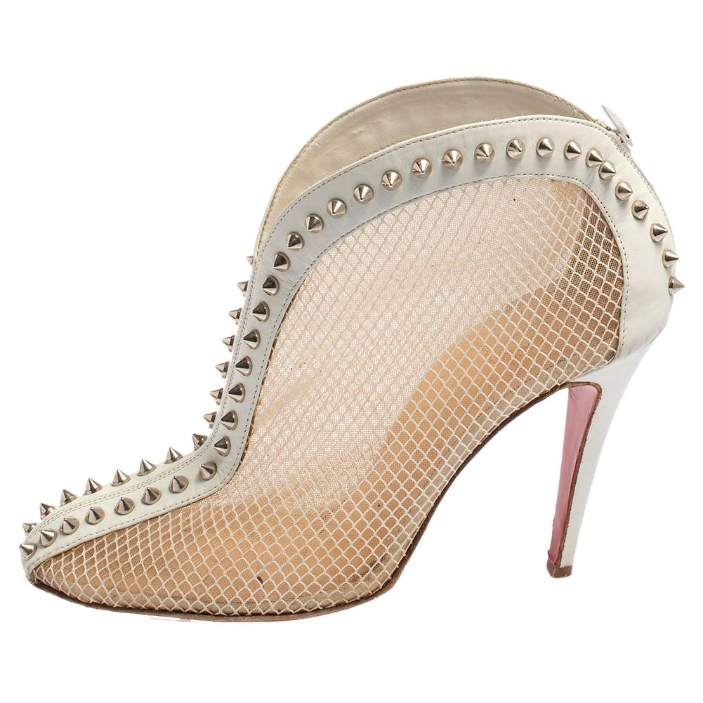 white louboutin booties