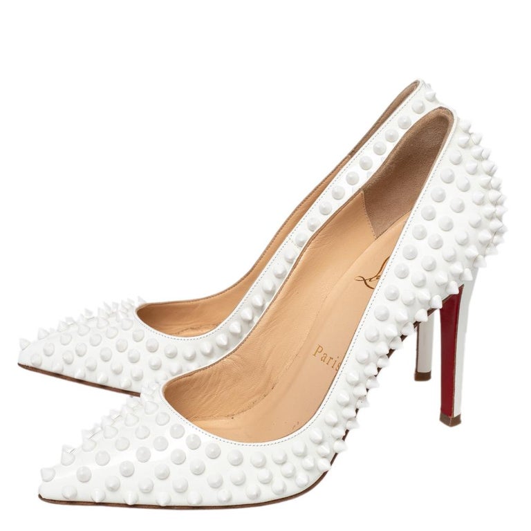 Christian Louboutin White Patent Leather Pigalle Spikes Pumps Size 37 1stDibs | louboutin spikes white, spike heels, white louboutin heels