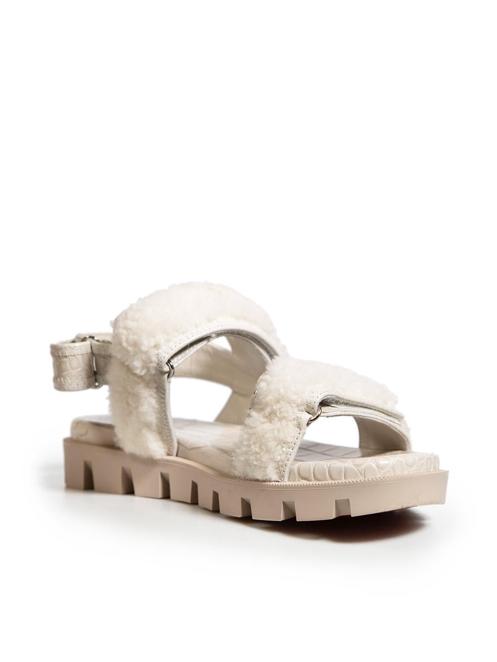 CONDITION is Very good. Minimal wear to sandals is evident. Minimal wear to rubber midsoles with light abrasions to the front and back of both shoes on this used Christian Louboutin designer resale item. The item comes with its original box.
 
 
 
