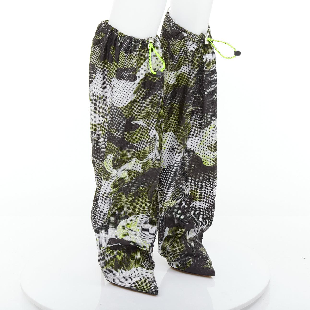 CHRISTIAN LOUBOUTIN Wind Botta 100 green camo nylon heel boots EU38
Reference: TGAS/E00188
Brand: Christian Louboutin
Model: Wind Botta 100
Material: Nylon
Color: Green, Multicolour
Pattern: Camouflage
Closure: Drawstring
Lining: White Leather
Extra