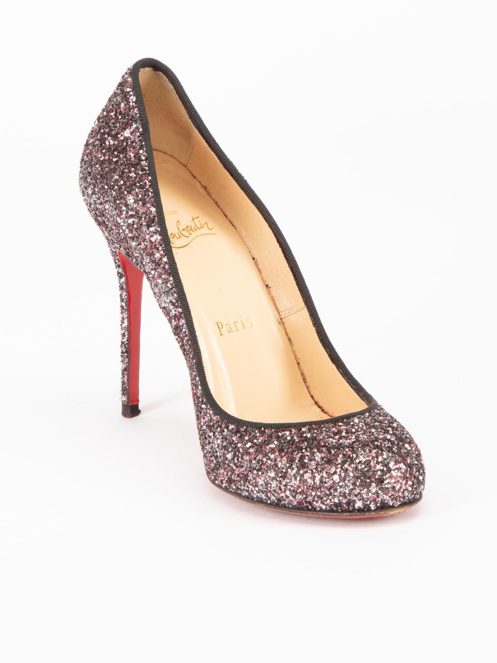 CONDITION is Very good. Hardly any visible wear to shoes is evident on this used Christian Louboutin designer resale item. This item comes with original dustbags. 
 
 Details
  Purple
 Glitter
 Slip on heels
 Round toe
 High heels
 Leather interior
