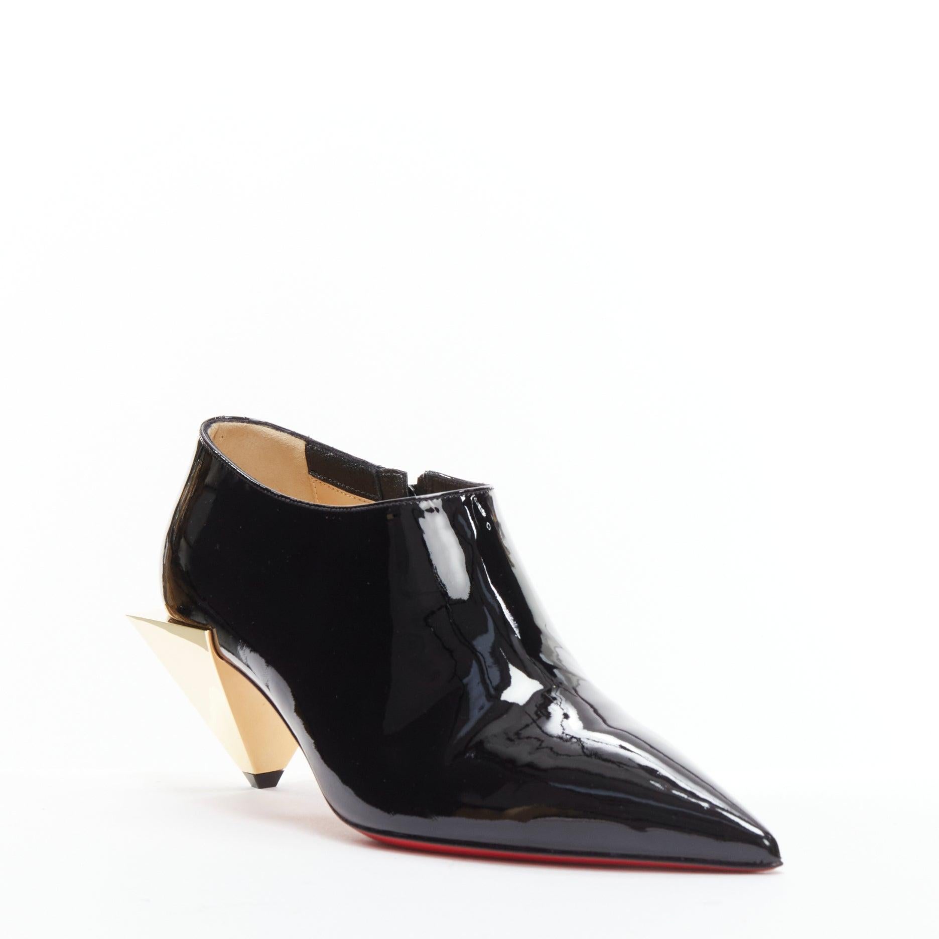 CHRISTIAN LOUBOUTIN Xilobooties 55 gold pyramid heel black patent pump EU38
Reference: TGAS/D00642
Brand: Christian Louboutin
Model: Xilobooties 55
Material: Patent Leather, Metal
Color: Black, Gold
Pattern: Solid
Closure: Zip
Lining: Nude