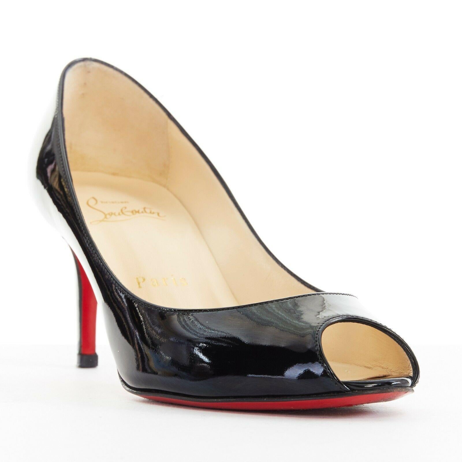 CHRISTIAN LOUBOUTIN You You 70 black patent leather peep toe mid high heel EU37
CHRISTIAN LOUBOUTIN
You you 70. Black patent leather upper. 
Peep toe. Tonal stitching. Signature red lacquared sole. 
Padded tan leather lining. 
Made in