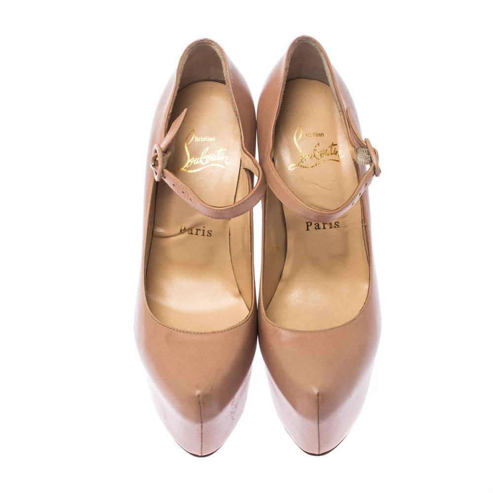Take your love for Louboutins to new heights by adding this gorgeous pair to your collection. The pumps simply speak high fashion in every stitch and curve. The exteriors come made from beige leather and the pumps are finished with platforms, 15 cm