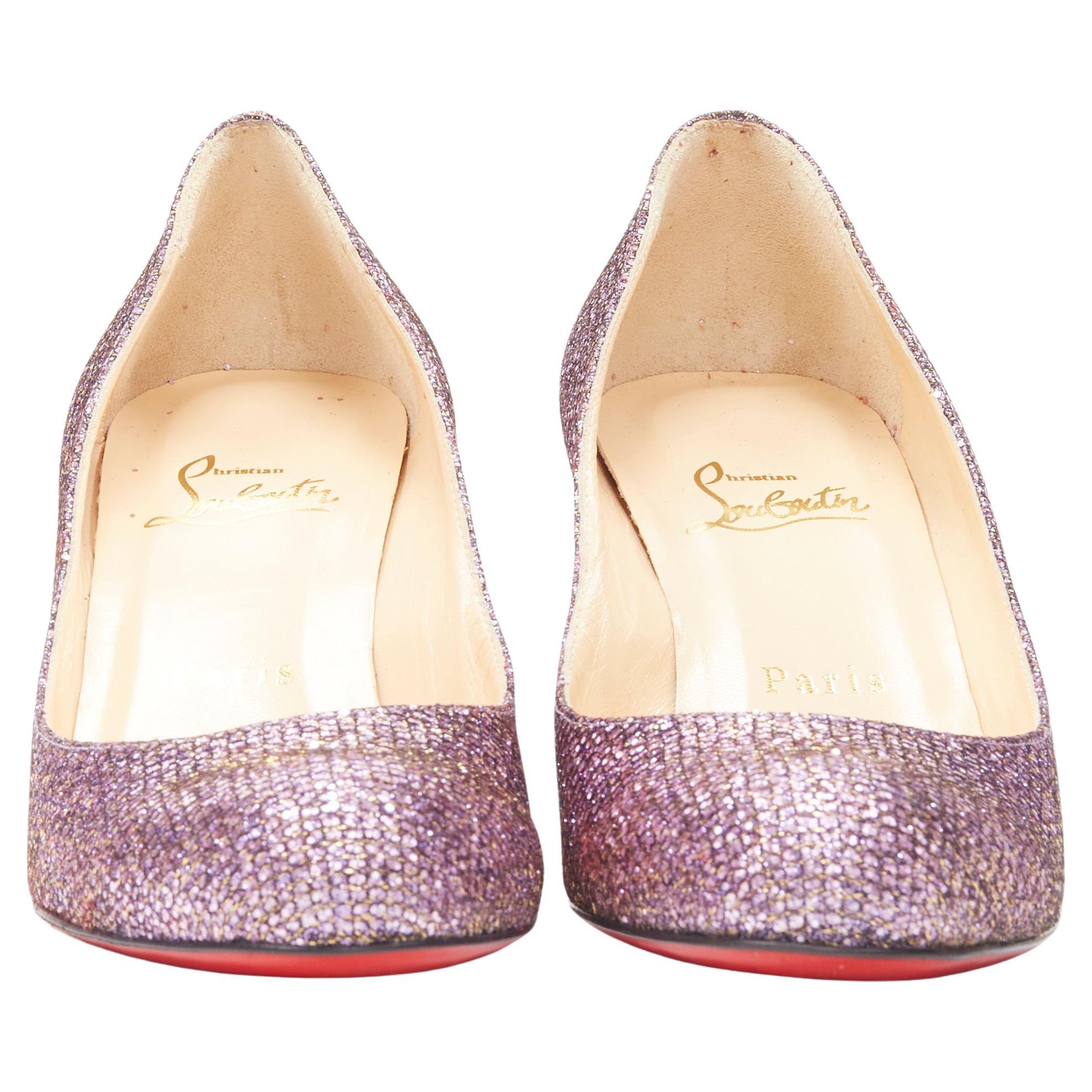 CHRISTIAN LOUOUTIN Fifi pink gold glitter round toe mid heel pump EU37.5 
Reference: MELK/A00192 
Brand: Christian Louboutin 
Model: Fifi 
Material: Leather 
Color: Pink 
Pattern: Solid 
Made in: Italy 

CONDITION: 
Condition: Excellent, this item