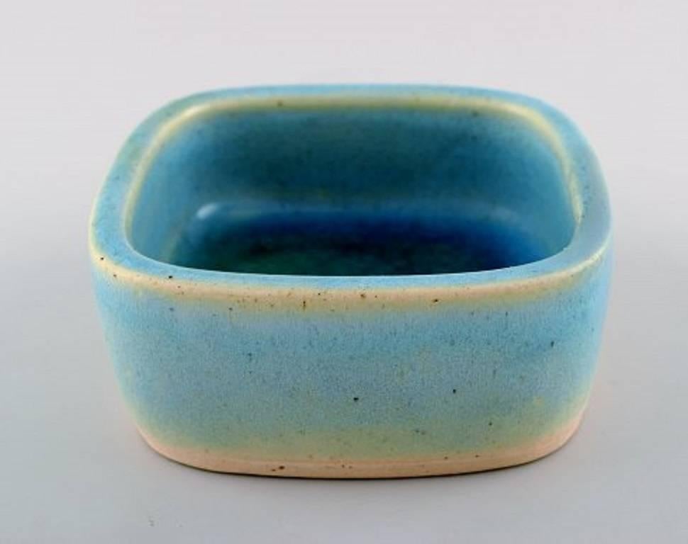 Christian Poulsen unique ceramic bowl, own workshop.
Marked: CHR. P.
Glaze in turquoise shades.
Measures: 12 x 5 cm.