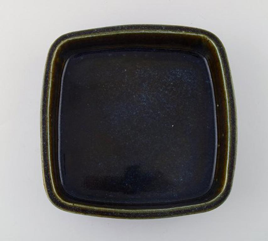 Christian Poulsen unique ceramic dish, own workshop.
Marked: CHR. P.
Mid-20th century, Danish modern.
Glaze in blue green shades.
Measures 19.5 cm x 19.5 cm.