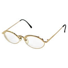 Occhiali da vista Christian Roth Optical Affairs, montatura ovale in metallo color oro, anni '90 circa