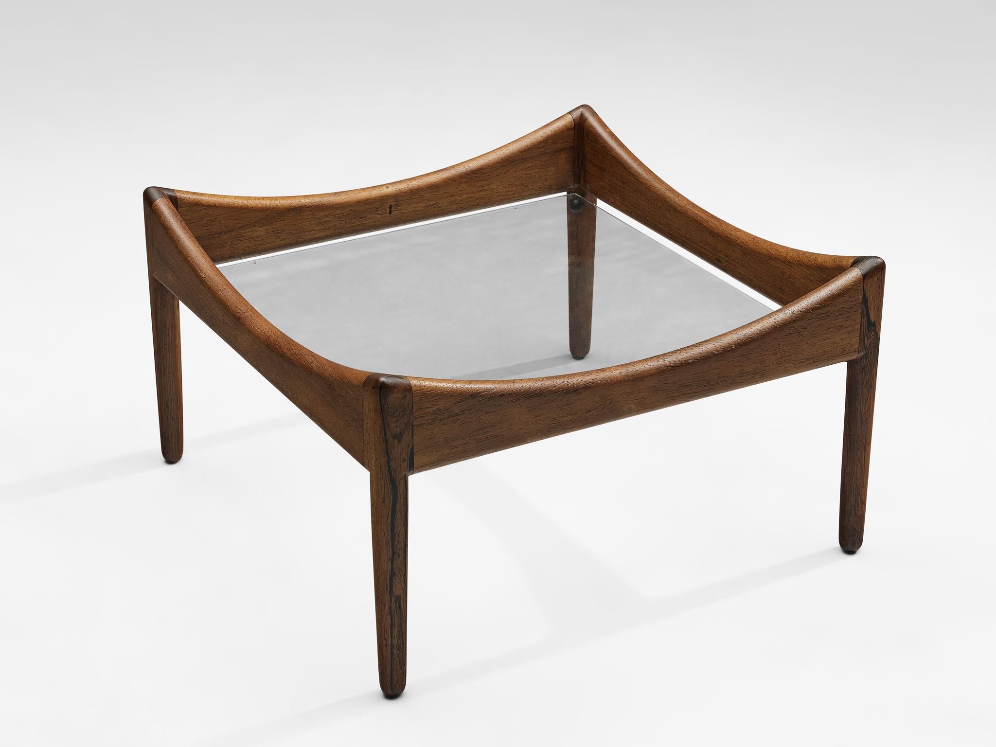 Kristian Solmer Vedel for Søren Willadsen, ‘Modus’ side table, rosewood and glass, Denmark, 1960s. 

A rosewood, steel and glass coffee table designed as part of the Modus range of furniture by Kristian Vedel, produced by Soren Willadsen, Denmark.