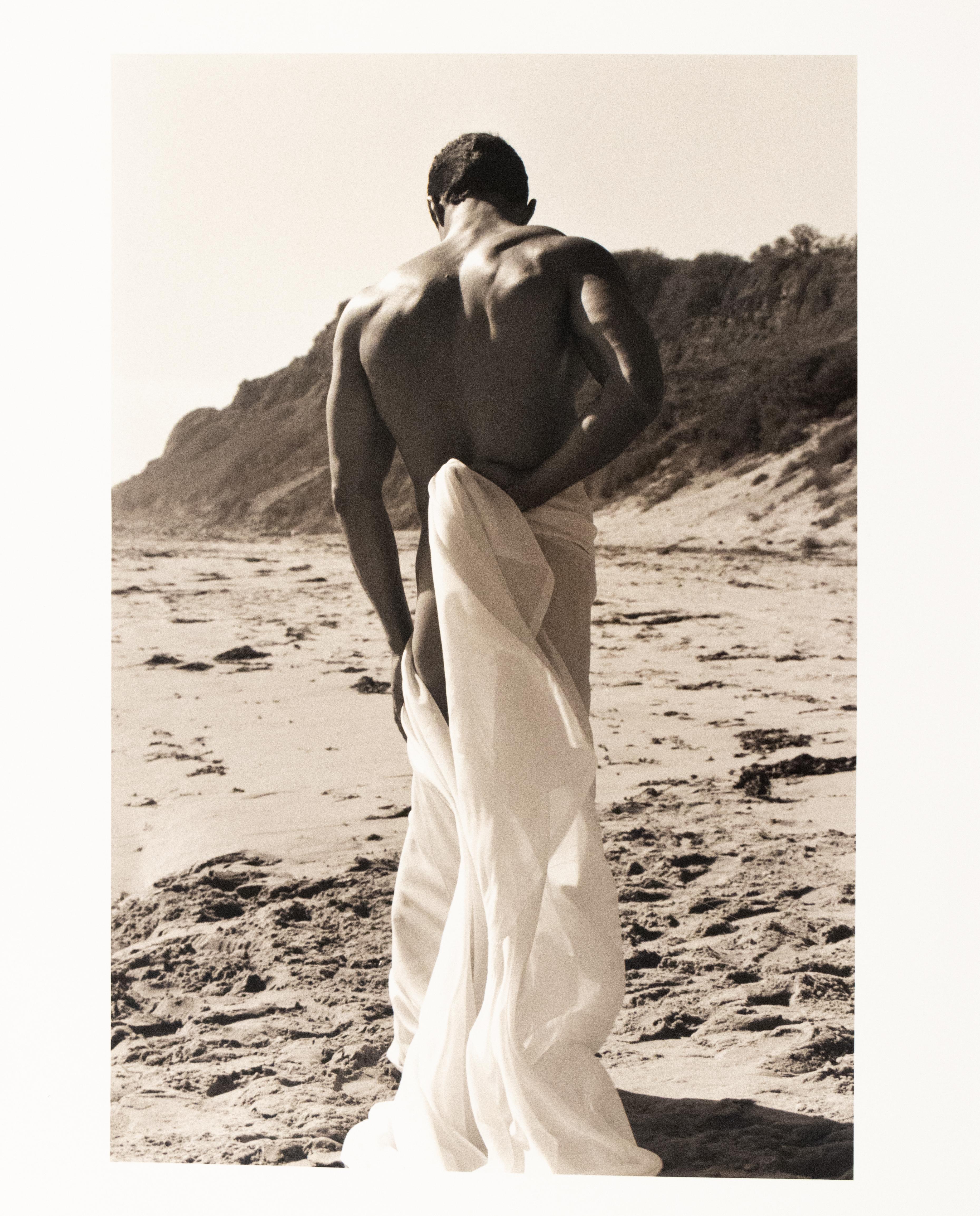 Draped Figure with Train
1989

Signed, titled, and numbered in pencil, verso

Sepia hand-toned silver print (Edition of 15)

17.5 x 12 inches, image