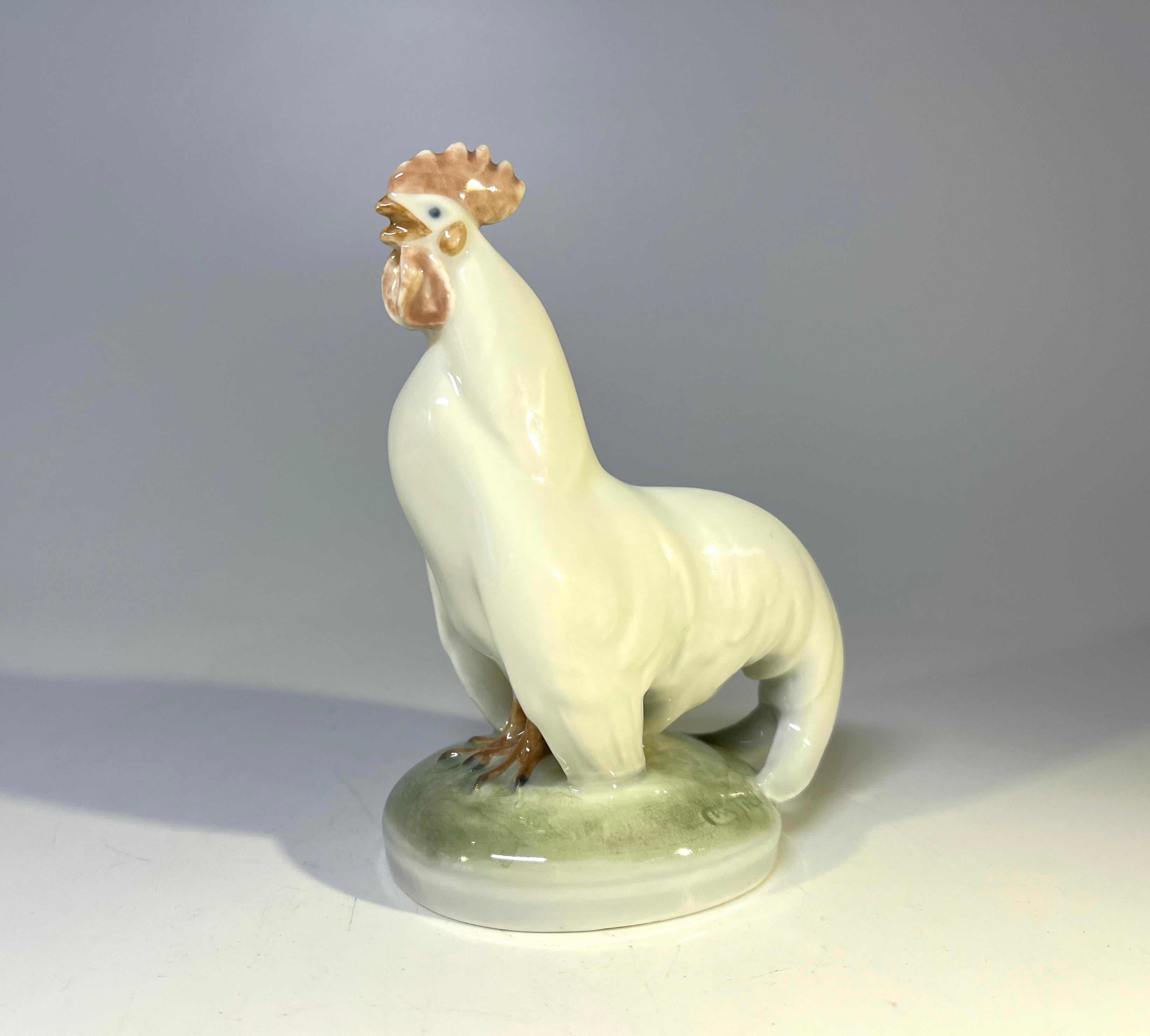 Christian Thomsen for Royal Copenhagen porcelain cockerel figurine.
Created in 1923, a classic collectible piece.
Signed and numbered 1126.
circa 1923.
Measures: height 4.25 inch, width 3 inch, depth 2 inch.
In excellent condition.
 