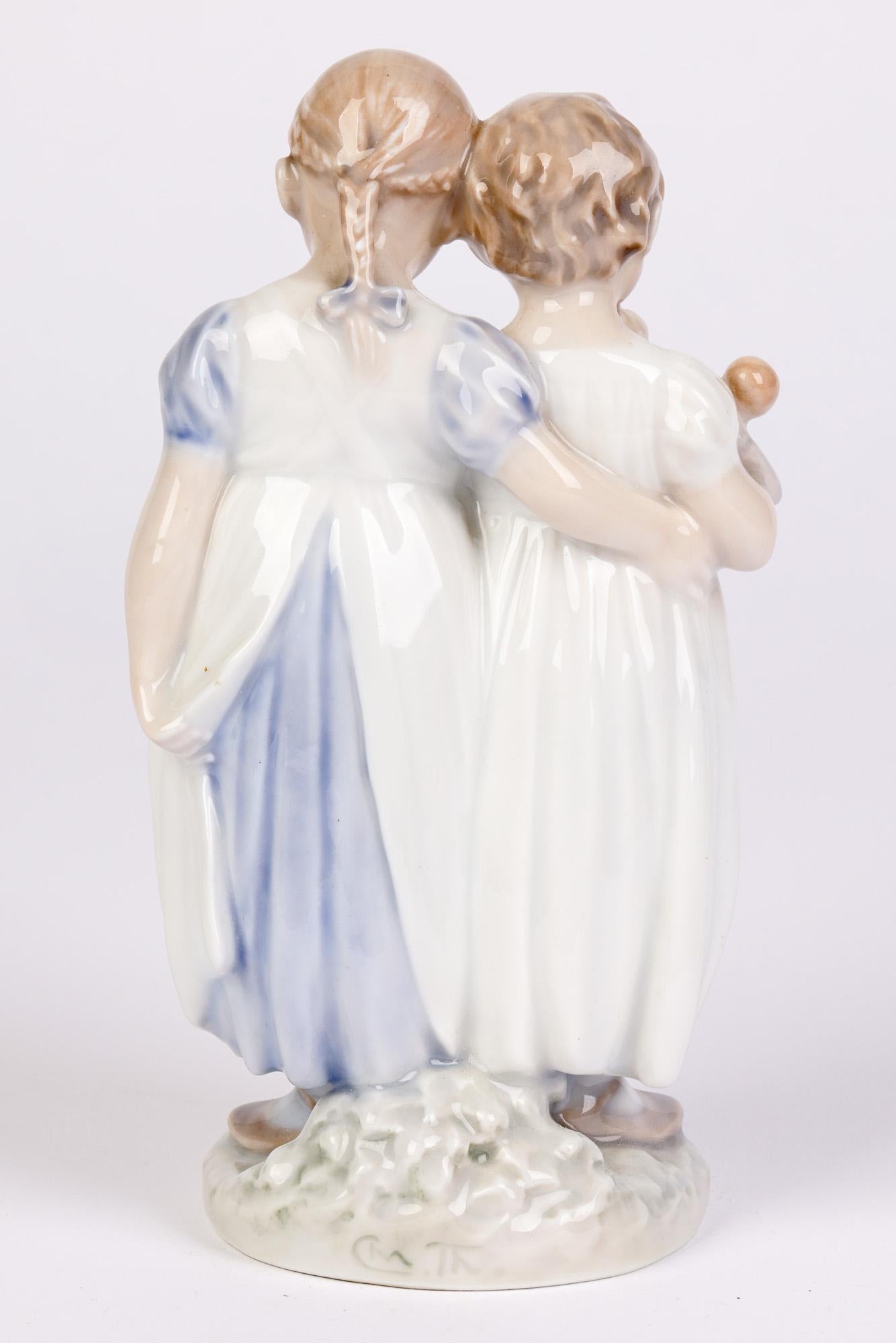 Danish Christian Thomsen Royal Copenhagen Two Girls and Doll Figure For Sale