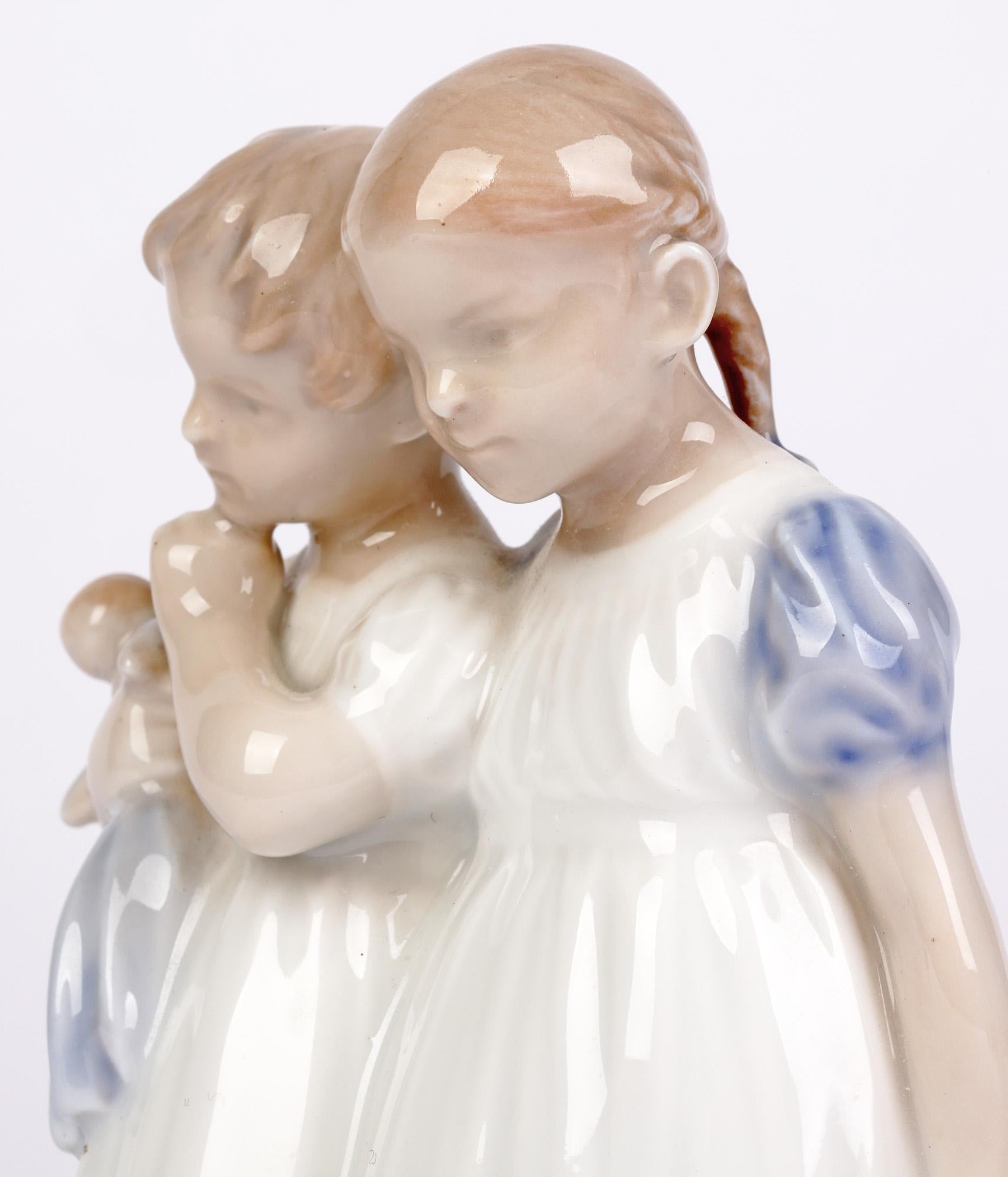 Glazed Christian Thomsen Royal Copenhagen Two Girls and Doll Figure For Sale