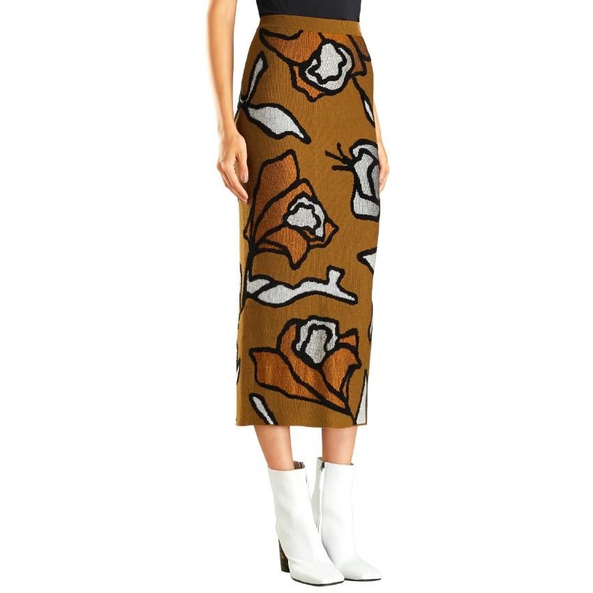 Christian Wijnants Kordi Floral-Jacquard Knit Pencil Skirt

-Brown floral maxi skirt
-Elasticated waistband
-Slit at the back
-Large floral print

Size S
Approx.

Length - 95cm
Waist - 33cm