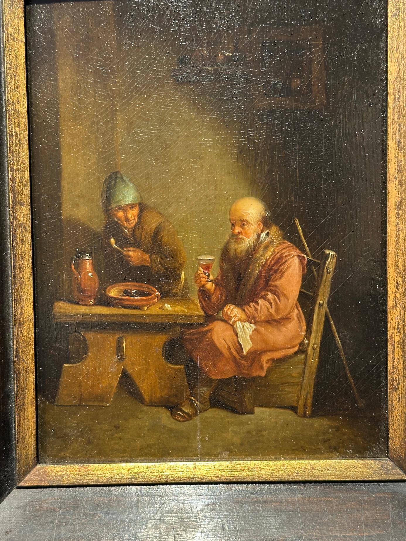 Cette peinture du XVIIIe siècle, attribuée à Christian Wilhelm Ernst Dietrich (1712-1774), représente un intérieur d'auberge rustique, un sujet fréquemment exploré par les peintres de genre hollandais et allemands de l'époque. Dietrich, peintre