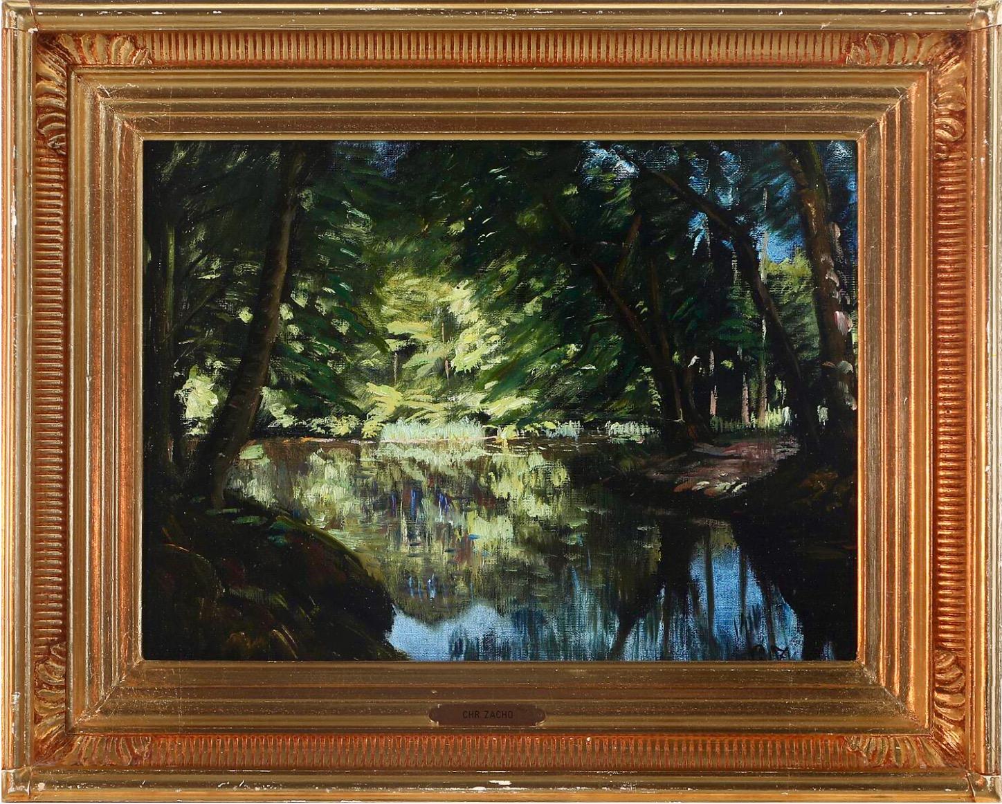 A still standing stream with shading trees and a sunlit opening over the water painted by Peter Mørch Christian Zacho (1843 - 1913). Oil on canvas laid on board. Signed C.Z. Probably painted in the late 19th century.
Zacho was a Danish landscape