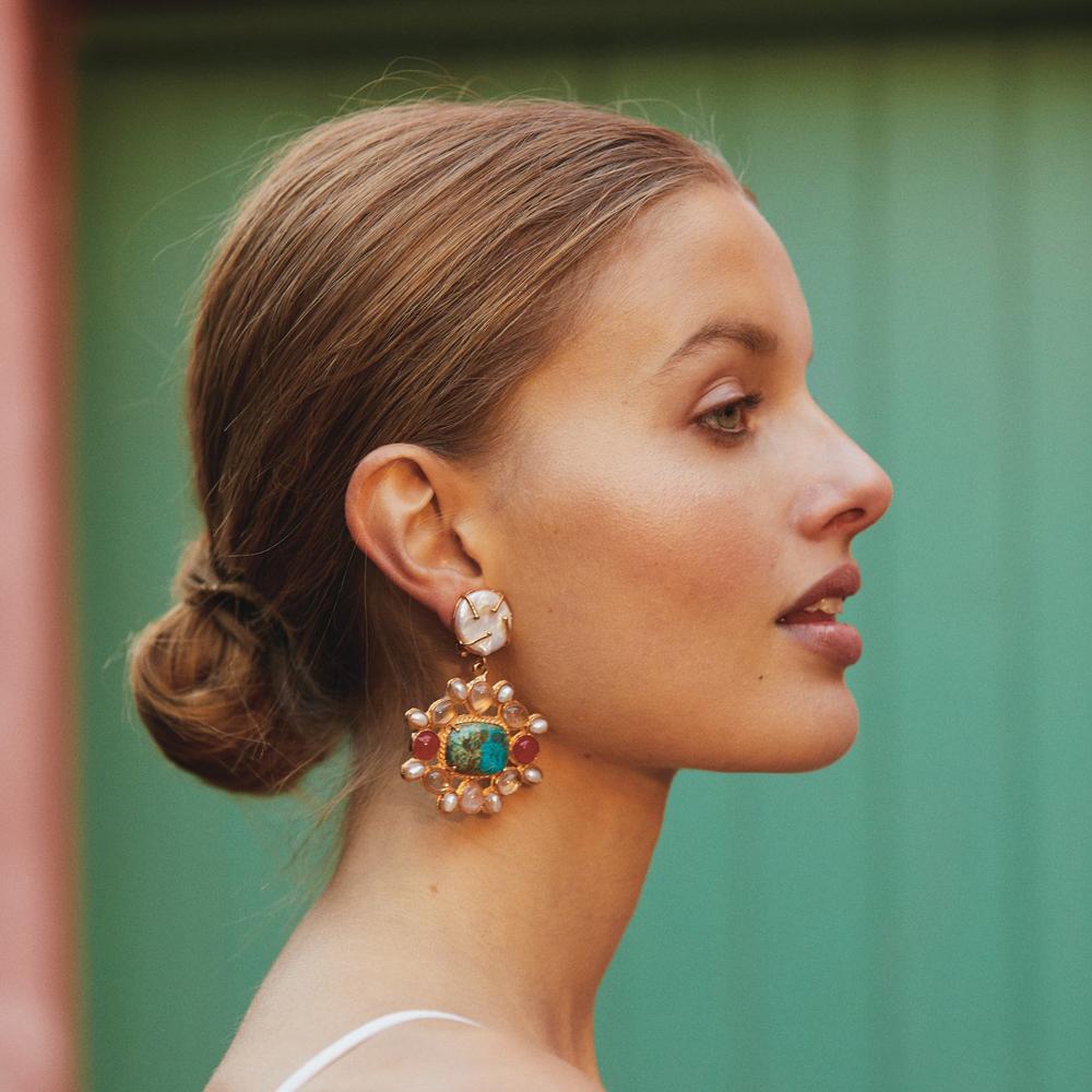 The Abriana Earrings are handcrafted in Europe. Created with 24k gold-plated brass, the Abriana Earrings feature with chrysocolla, rose quartz, clear quartz and freshwater seed pearls. Perfect for special occasions, bridal, cocktail parties and