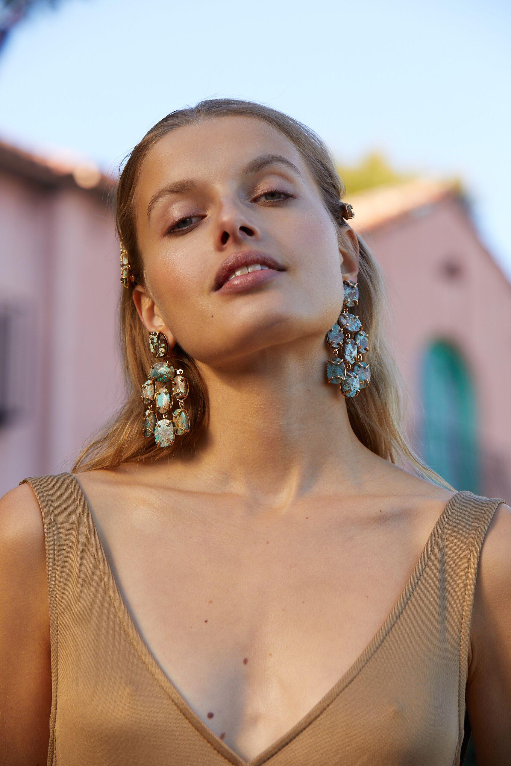 The Martina Earrings are handcrafted in Europe. Created with 24k gold-plated brass, the Martina Earrings feature with chrysocolla and turquoise. Perfect for special occasions, bridal, cocktail parties and black-tie events. 

Please note each and