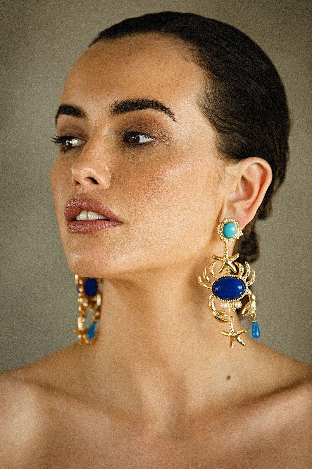 The Majolica Earrings are handcrafted in Europe. Created with 24k gold-plated brass, the Majolica Earrings are inspired the seaside of La Fontelina in Capri. With a uniquely creative design, these earrings are perfect for special occasions, bridal,