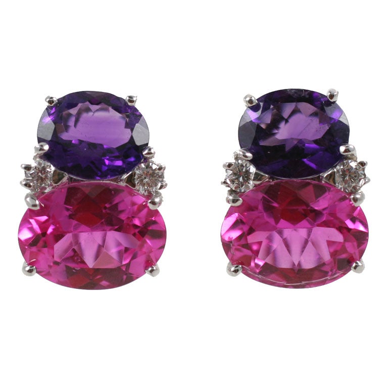 Christina Addison Beautiful Bespoke Large 18kt white gold GUM DROP™ earrings with Amethyst (approximately 5 cts each), Pink topaz (approximately 12 cts each), and 4 diamonds weighing 0.60 cts.

Specifications: Height: 7/8