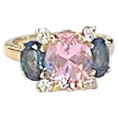 Christina Addison Small Gum Drop Ring with Pink Topaz Blue Topaz and Diamonds.