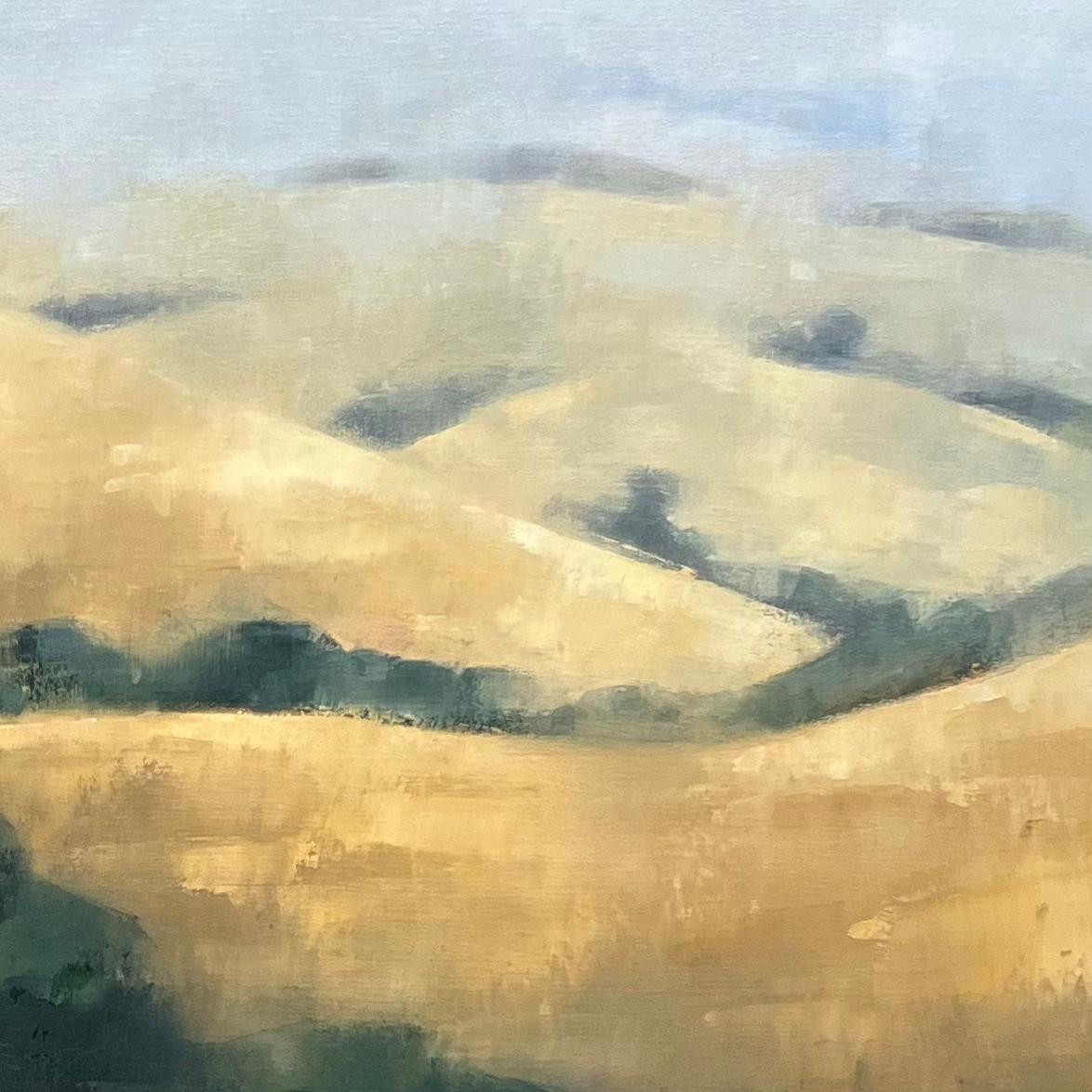 This original oil painting beautifully captures the essence of the Northern California landscape, depicting rolling hills of golden hay that stretch into the distance, eventually meeting cool blue-purple mountains on the horizon. Clusters of green