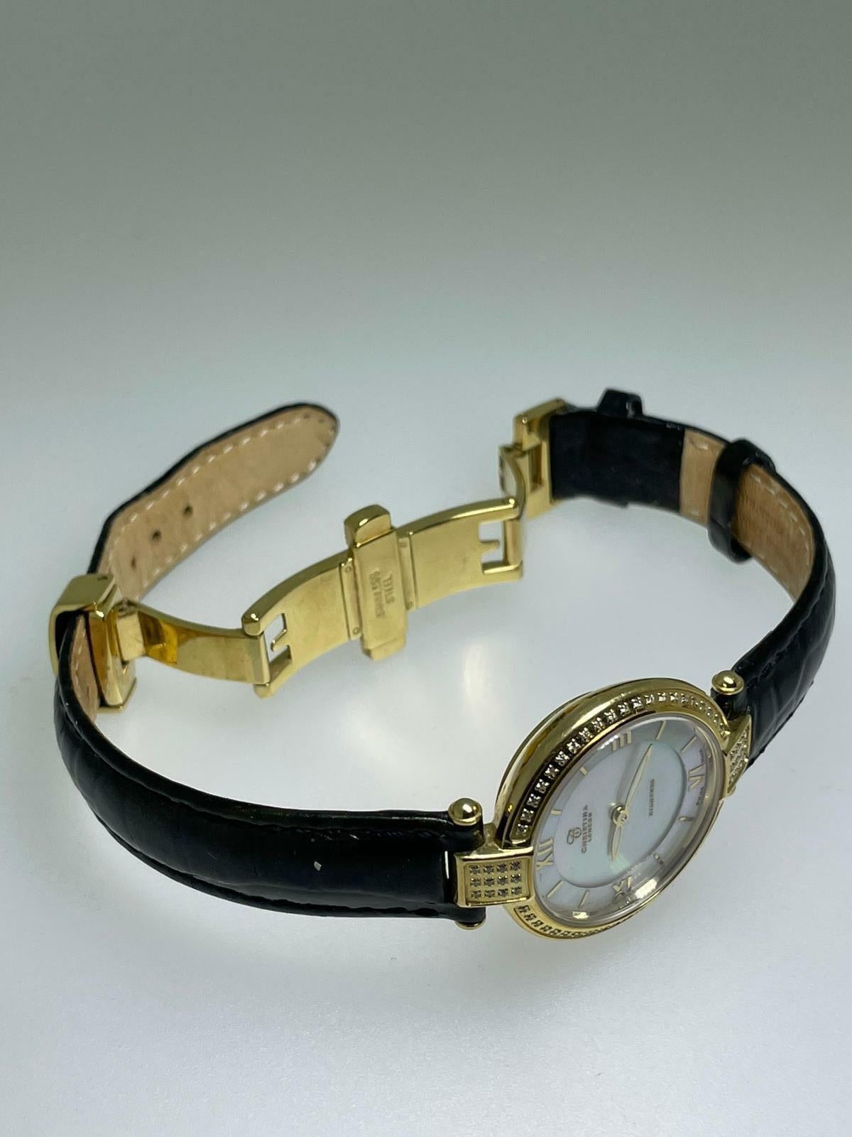 Reloj de señora Christina London con bisel de diamantes y esfera iridiscente chapado en oro de 18 quilates en venta 1