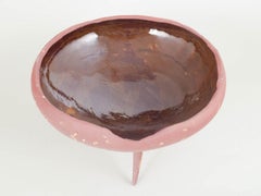 Christina Muff, Danish ceramic artist. Red stoneware bowl on three pointed legs.