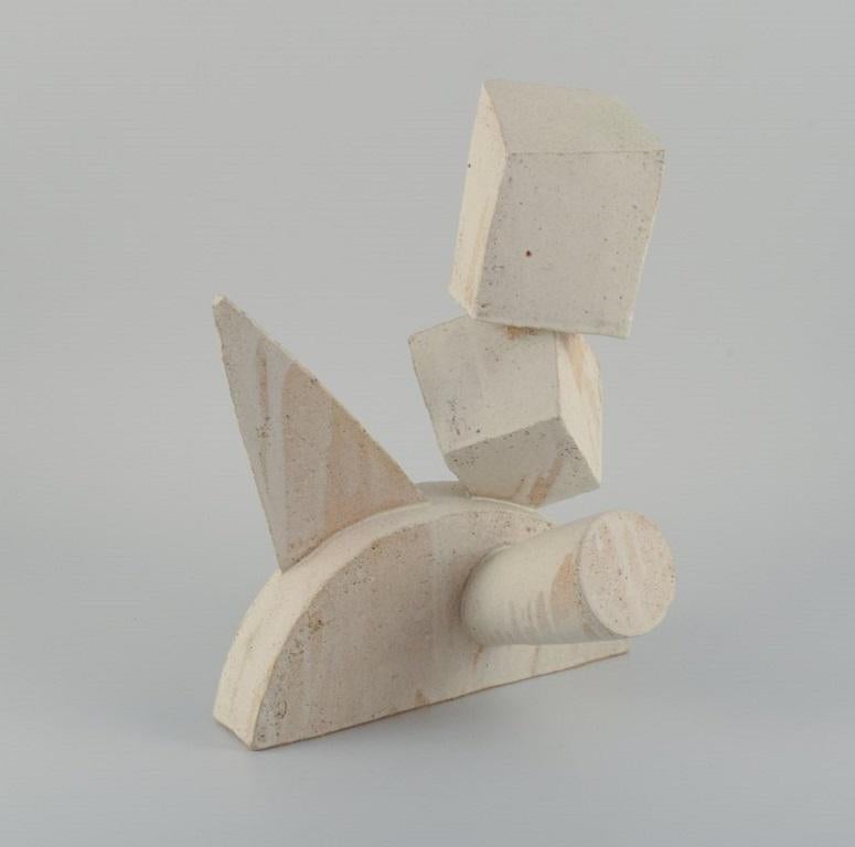 Christina Muff, Danish contemporary ceramicist (b. 1971). 
Cubist style monumental sculpture. This work is made from stoneware clay covered in off-white matte glaze.
Measuring: W 30 x H 39 cm.
In excellent condition.
Signed.

Technique -