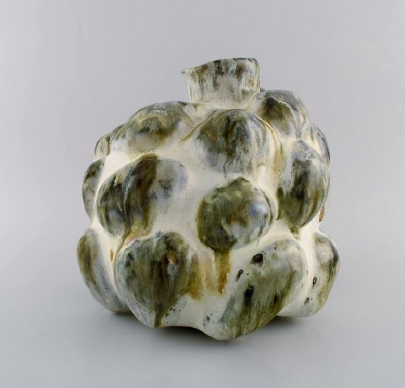 Christina Muff, Danish contemporary ceramicist (b. 1971). 
Sculptural unique vase in glazed stoneware. Beautiful cream white glaze with ocher yellow and gray celadon glaze.
Measures: 28 x 25 cm.
In excellent condition.
Signed.

Technique -