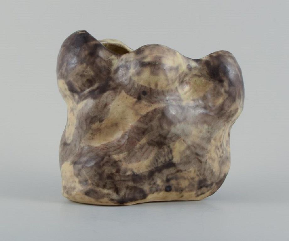Christina Muff, Danish contemporary ceramicist (b. 1971). 
Unique stoneware vase with cream/black matte glaze. Hand-modelled and organically shaped.
Measuring: W 21 x H 19 cm.
In excellent condition.
Signed.

Technique - Christina Muff’s forms are