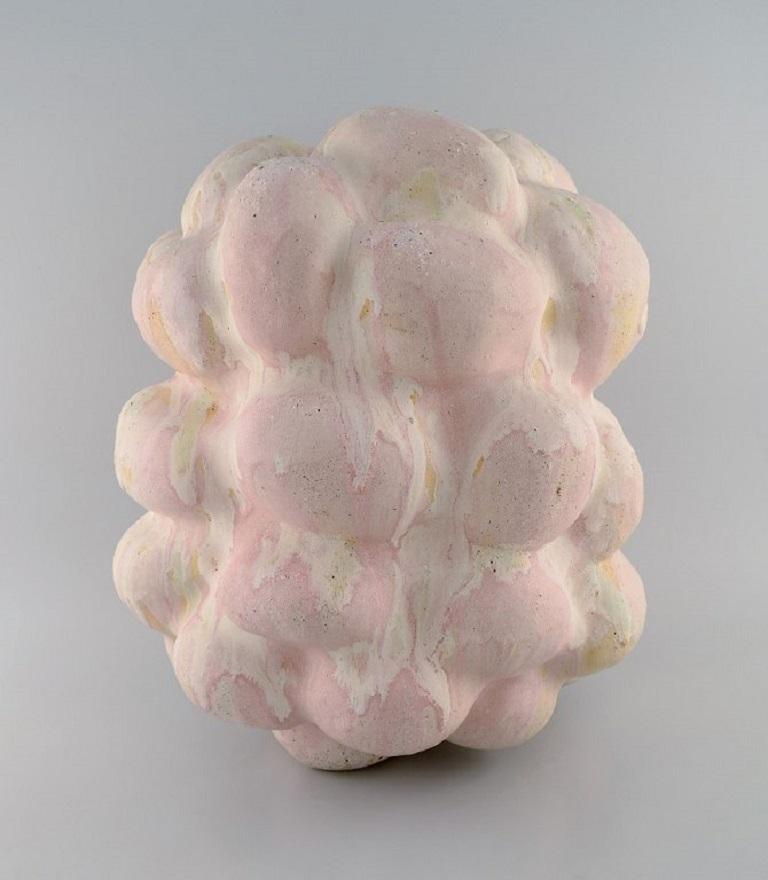 Christina Muff, Danish contemporary ceramicist (b. 1971). 
Very large sculptural unique vase in glazed stoneware. Beautiful cream / pink glaze with minerals from Danish beaches.
Measures: 42 x 36 cm.
In excellent condition.
Signed.

Technique