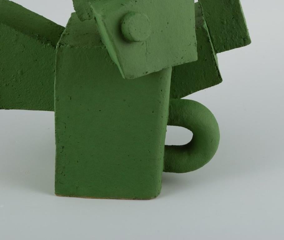 Contemporary Christina Muff, unique cubist stoneware sculpture in matte grass green glaze.  For Sale