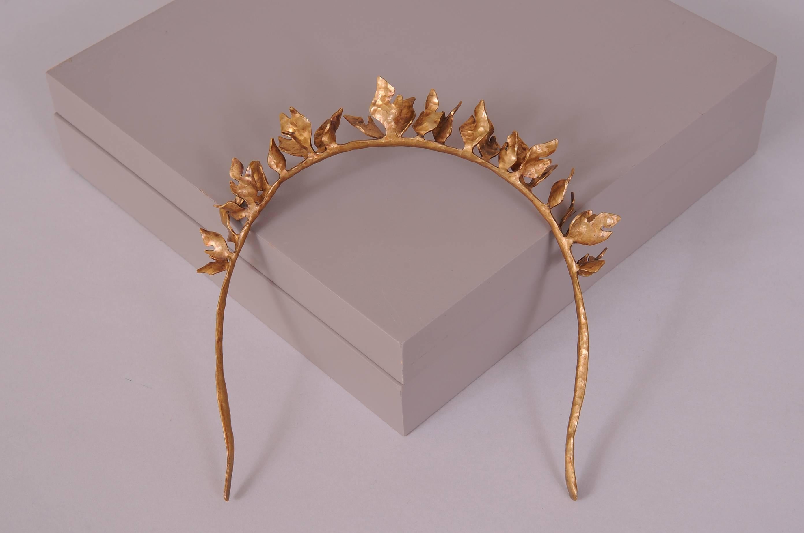 The grand daughter of Antonio Castillo and the daughter of Emilia Castillo, Christina Romo is a well regarded designer in her own right. This innovative design for a tiara or headband is made from tumbaga, an alloy of gold and copper. that was also