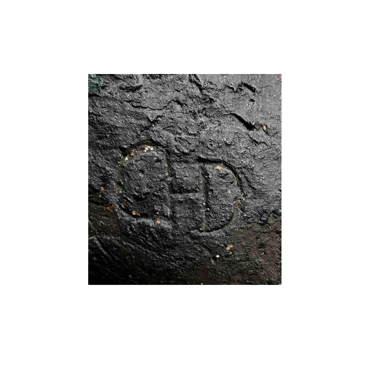 Christine Dewerny (*1947 Leipzig), Female Torso, c. 1986, dark colored clay mounted on a light stone stele, 19 x 10 x 7 cm (depiction), 27 x 10 x 10 cm (stele), monogrammed 