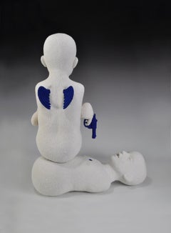 LITTLE ANGELS- surreal white and blue ceramic sculpture of boy with guns