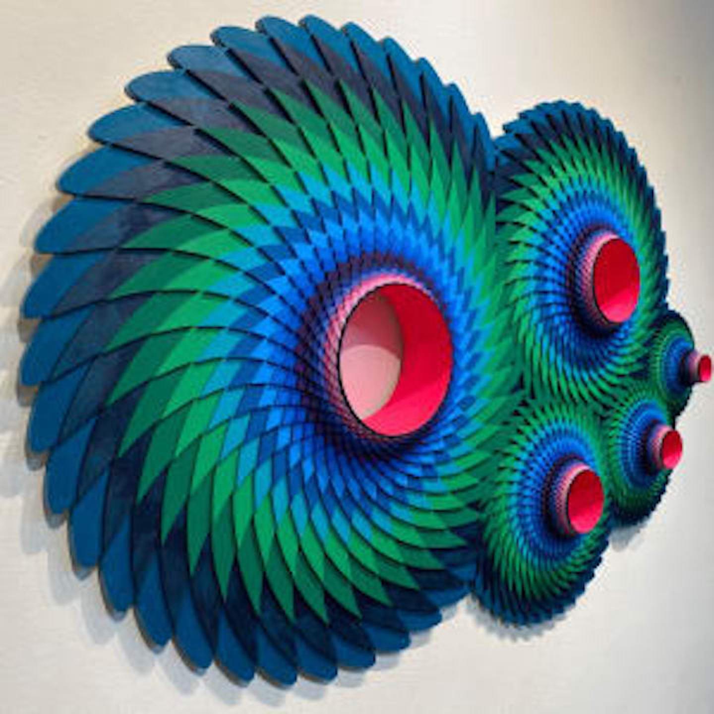 Geometrical gears in circular patterns with blue, green, pink and purple swirls. 
Acrylic on laser cut wood by Christine Romanell.  Original, unique art signed on verso.  Ready to hang.

ARTIST BIO 
Christine Romanell’s colorful wall sculptures and