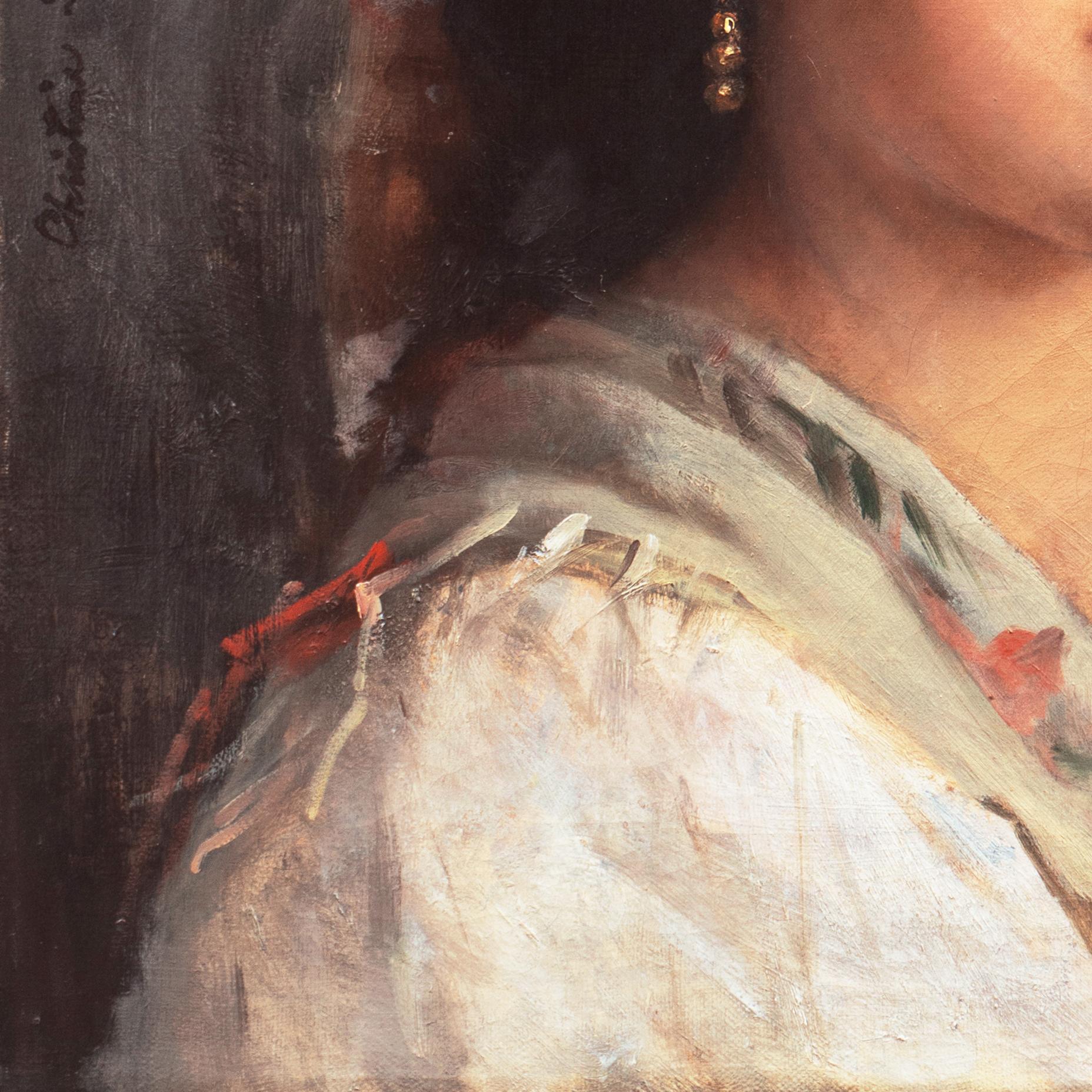 Jeune femme à la boucle d'oreille en or